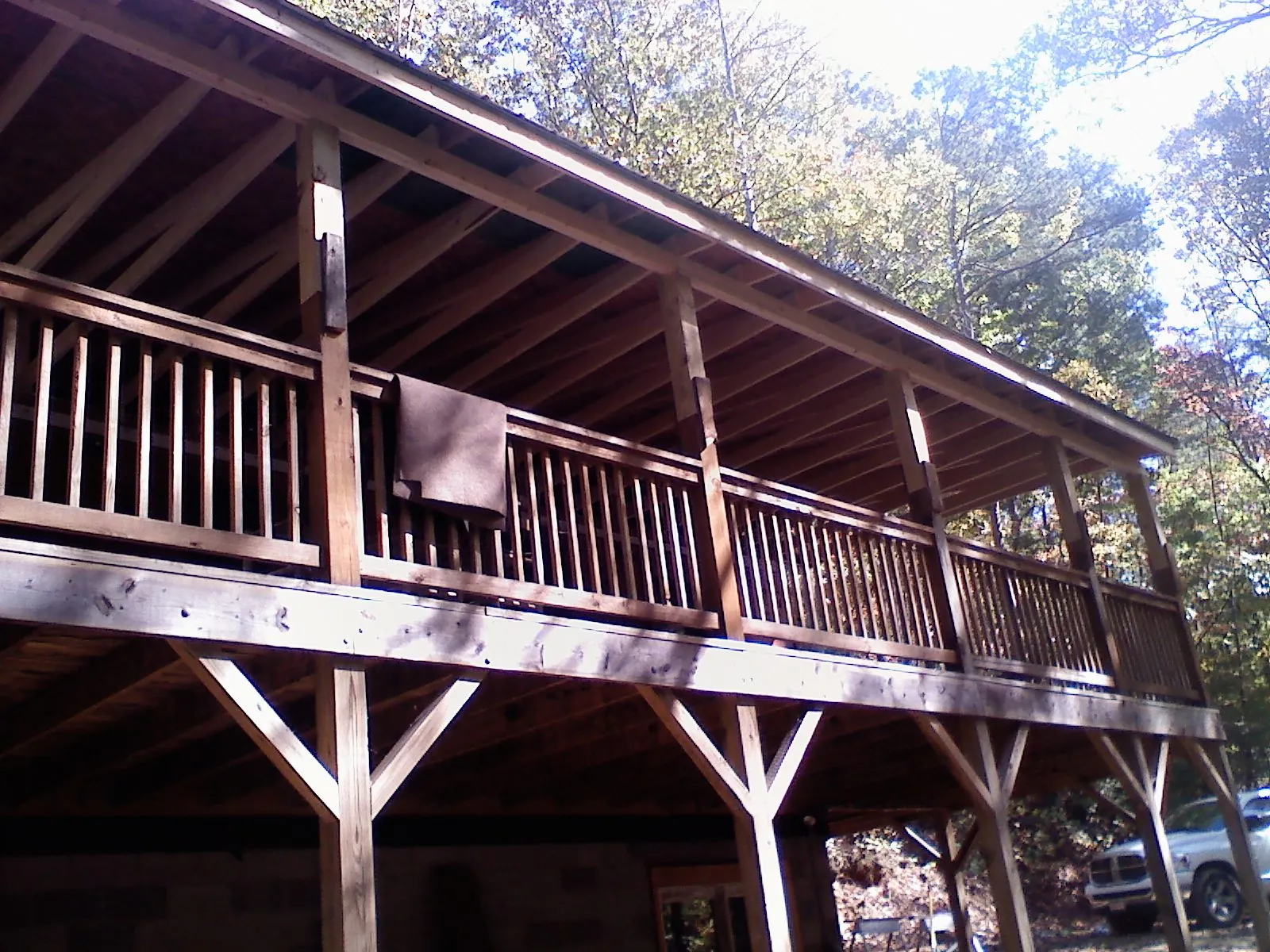 Timber framing under a new elevated porch and deck — Roof Leak Repair in Hamersville by Roofing Brothers